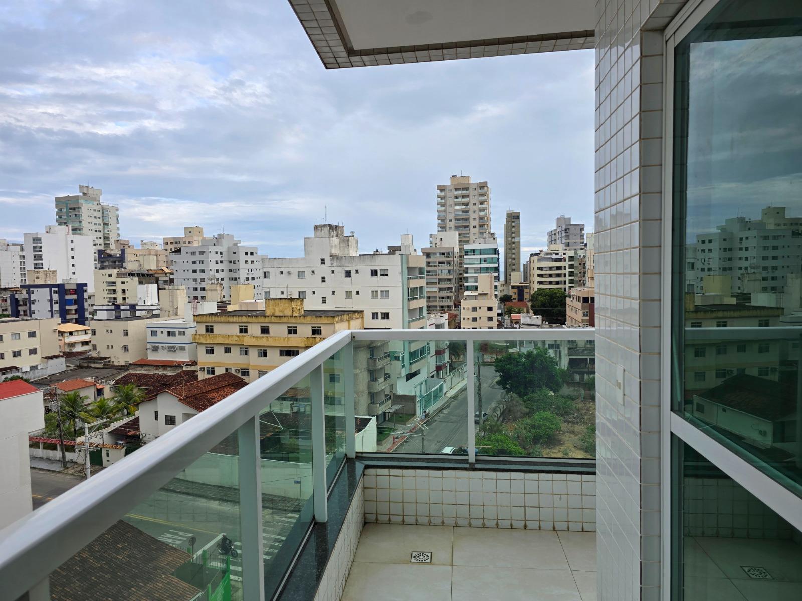 Apartamento à venda na Praia do Morro, Guarapari-ES: 2 quartos, 1 suíte, 2 salas, 1 vaga de garagem, 75m² de área. Venha conferir!